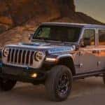 A 2021 Jeep Wrangler 4xe is shown from the front at an angle after the owner searched 'off road vehicle sales'.