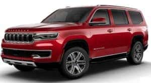 A red 2023 Wagoneer L is shown angled left.