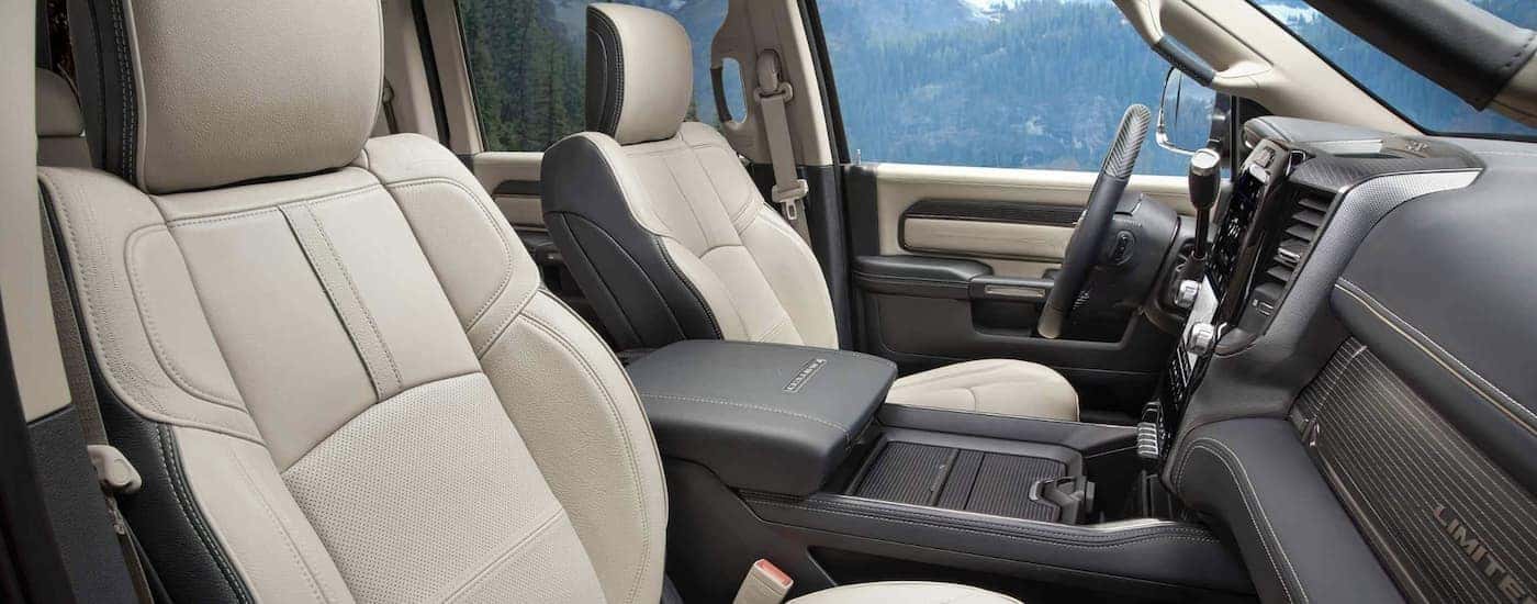 The grey and tan interior is shown in a 2022 Ram 2500 Limited.