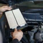Changing engine air filter as part of Jeep service schedule
