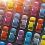 Rows of cars at a used car dealership in Costa Mesa, CA