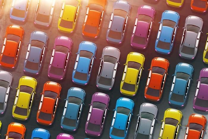 Rows of cars at a used car dealership in Costa Mesa, CA