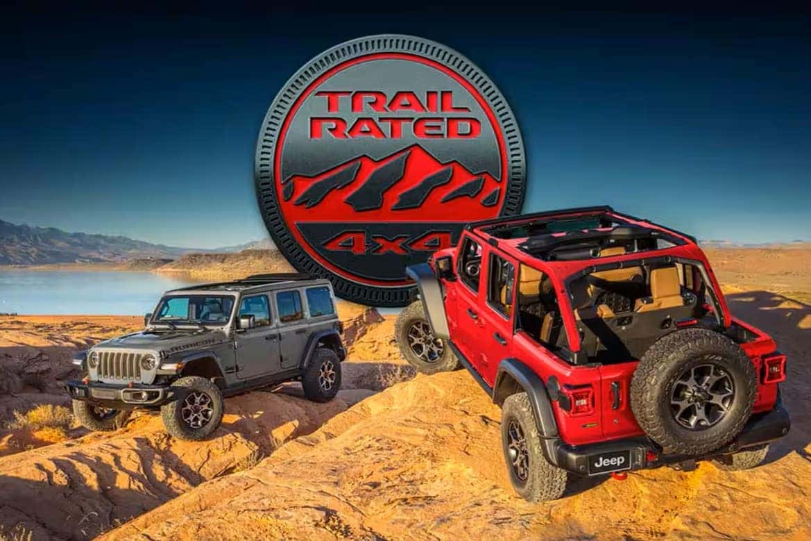 Jeep Trail Rated badge display image with 2 jeep wranglers on rough terrain