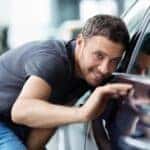 Person looking at used car financing