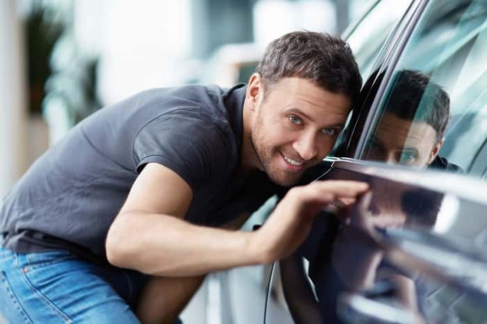 Person looking at used car financing