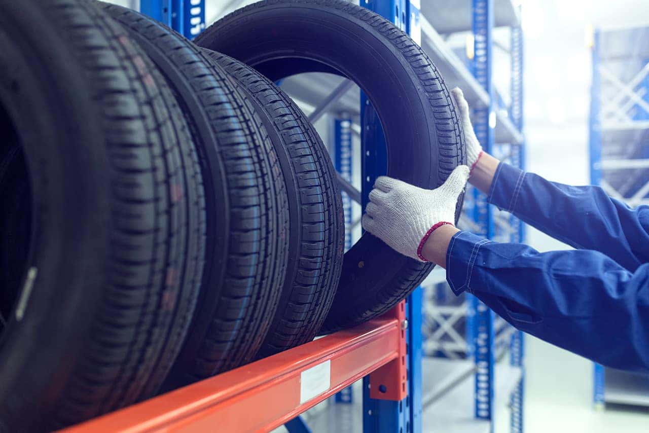 Technician picking out new Jeep tires