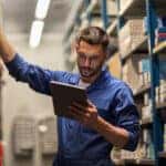Technician picking out RAM parts