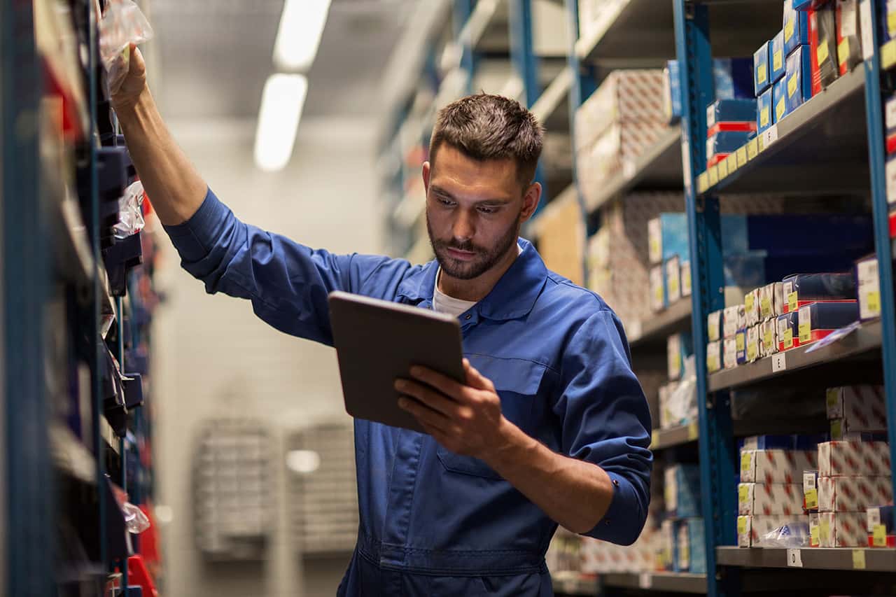 Technician picking out RAM parts