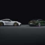 two 2025 Porsche 911 GT3 vehicles parked in a dark display room highlighting their features