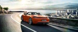 Porsche driving on highway