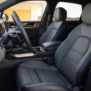 the interior front view looking towards the front passenger in a porsche cayenne