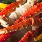 Cooked crab legs on a dinner plate