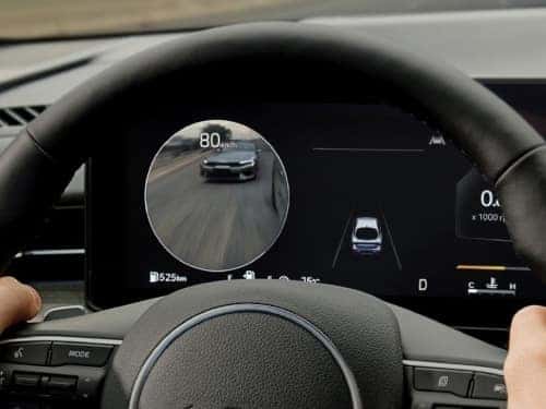 2025 Kia K5 driver dash showing view of blind spot view monitor