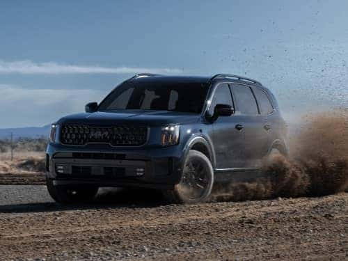 2025 Kia Telluride offroading on a dirt terrain