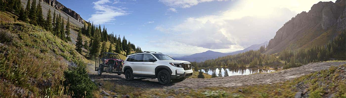 Honda SUV in front of mountain landscape
