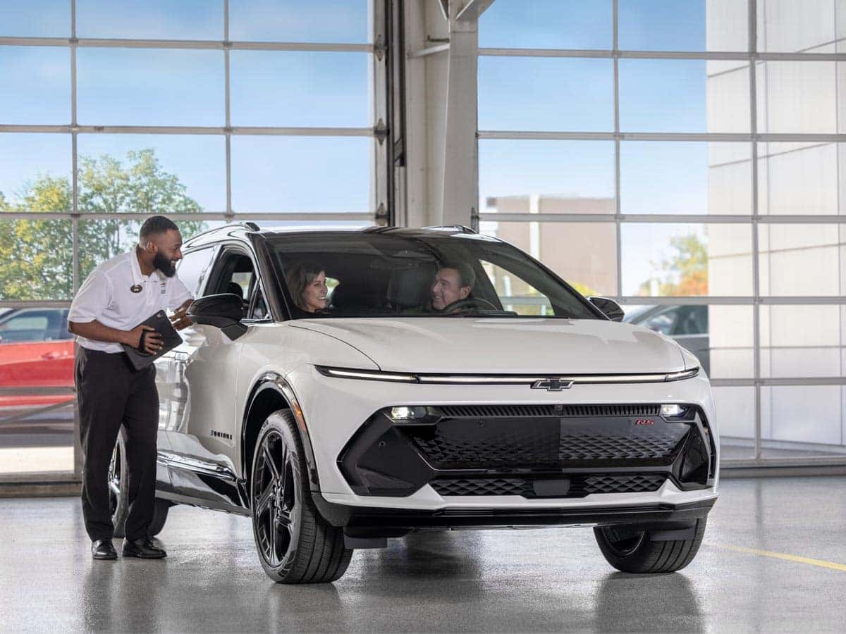EV-certified technician servicing a Chevrolet electric vehicle at Roseville Chevrolet