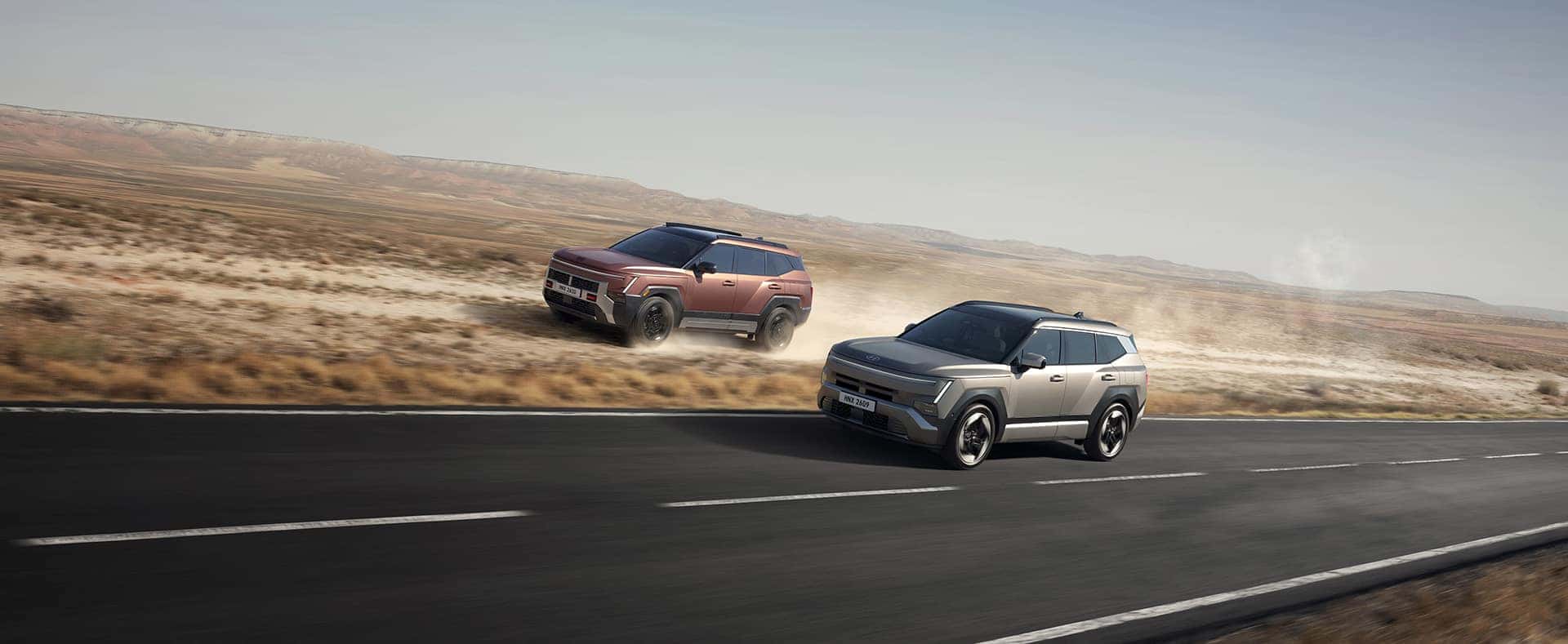 2027 Hyundai TUCSON Hybrid XRT PRO driving through the desert