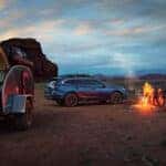 subaru suv with people camping
