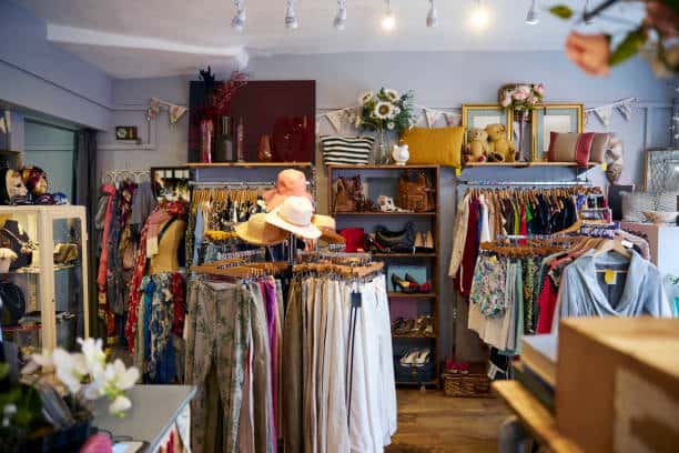 Interior Of Thrift Shop Selling Used And Sustainable Clothing And Household Goods