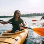 man and woman kayaking
