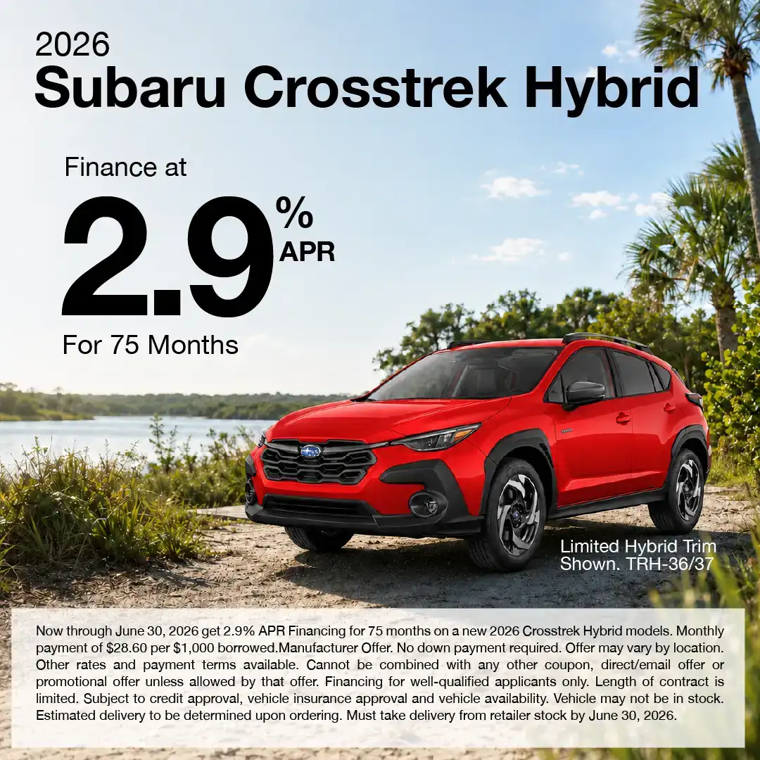 Promotional graphic for the 2026 Subaru Crosstrek Hybrid showing a red Crosstrek Hybrid parked near a lake with palm trees and greenery. Text reads: “Finance at 2.9% APR for 75 months.” Offer valid through June 30, 2026.
