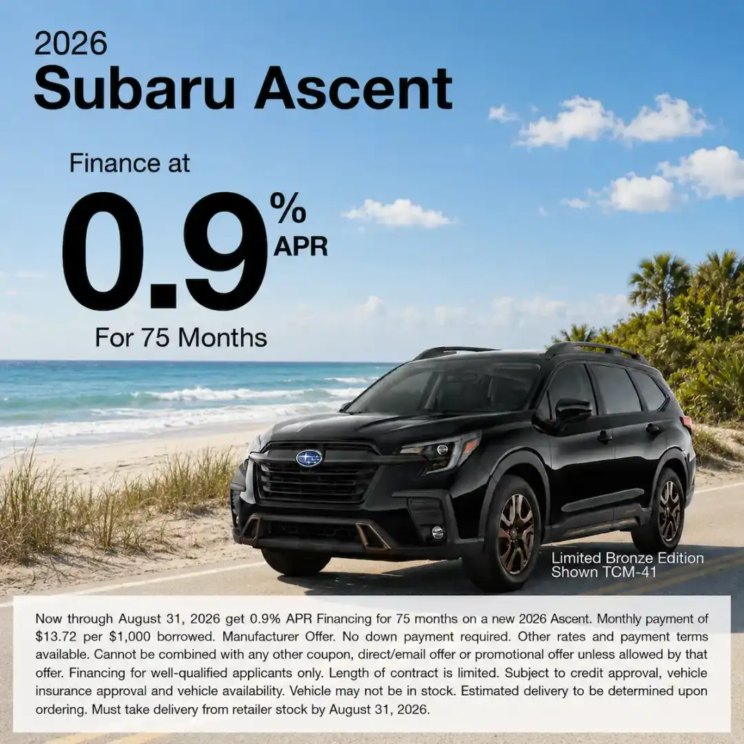 Promotional graphic for the 2026 Subaru Ascent showing a black Ascent parked on a scenic road beside a lake and pine trees. Text reads: “Finance at 0.9% APR for 75 months.” Offer valid through August 31, 2026.