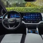 Chevy Equinox interior at Starling Chevrolet in Orlando, FL — 2027 model cabin, touchscreen, and cargo space