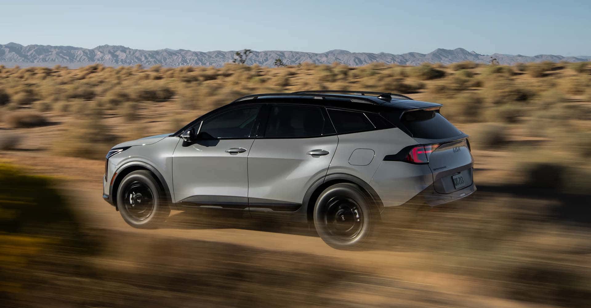 2026-Kia-Sportage-driving-through-desert