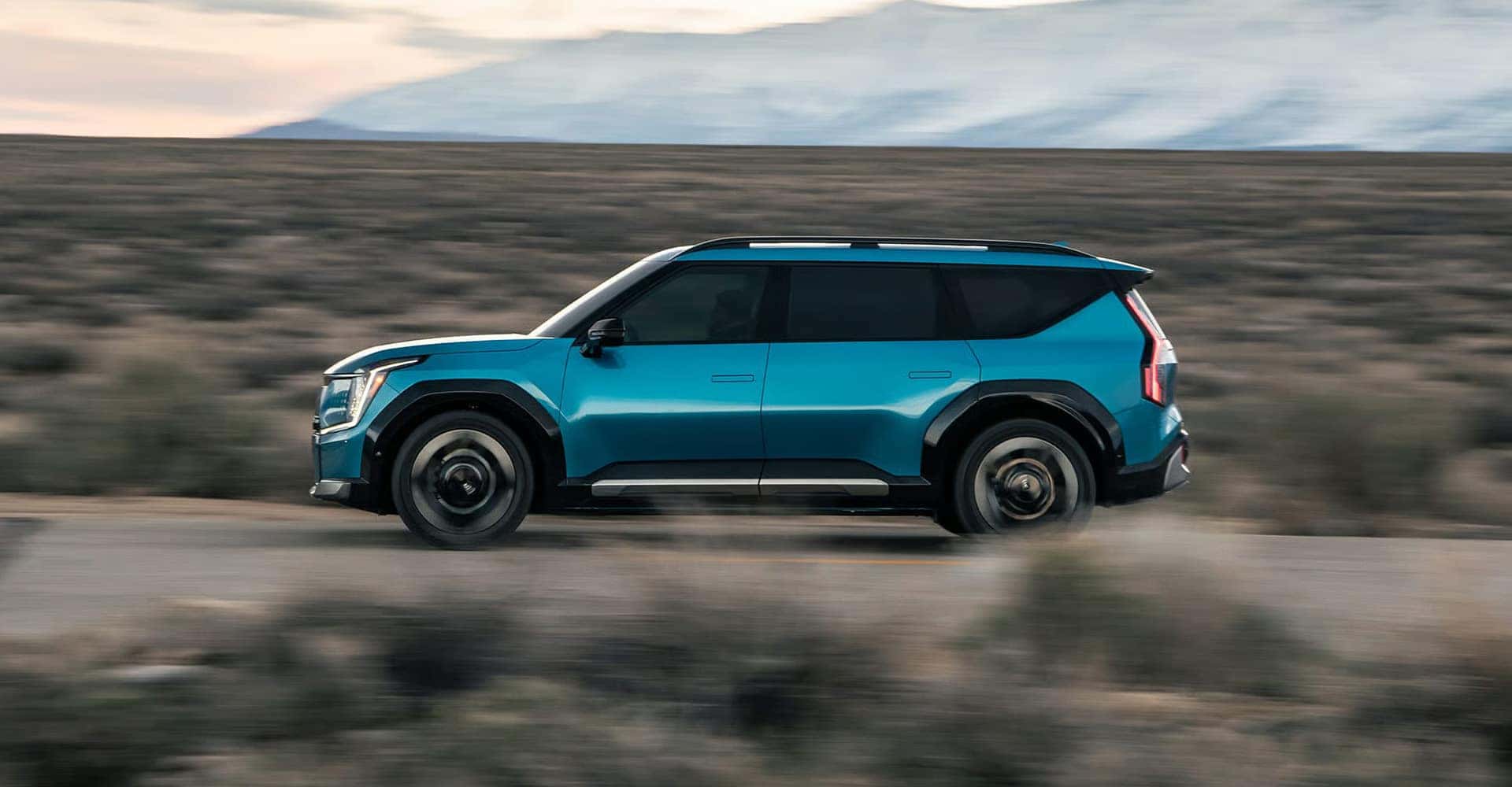 2026-KIA-EV9-side-view-driving
