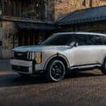 Body color auto-extending door handles (flush when not in use) shown on the SX Prestige in Ivory Silver_