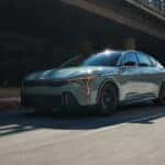 2026-Kia-K4-driving-down-exit-of-highway