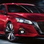 2019 red altima driving in city