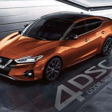 2020 Nissan Maxima parked in front of a building