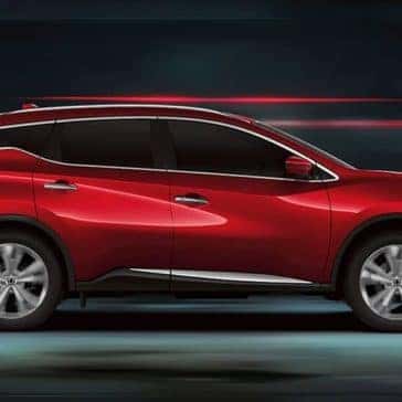 2020 Nissan Murano driving down a road at night
