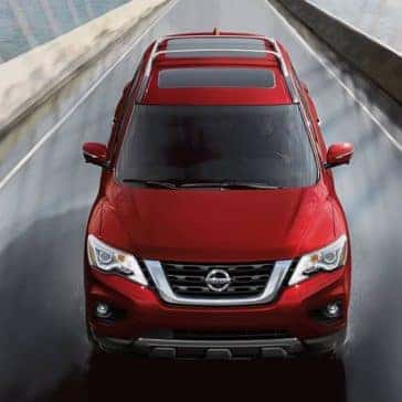2020 Nissan Pathfinder driving over a bridge