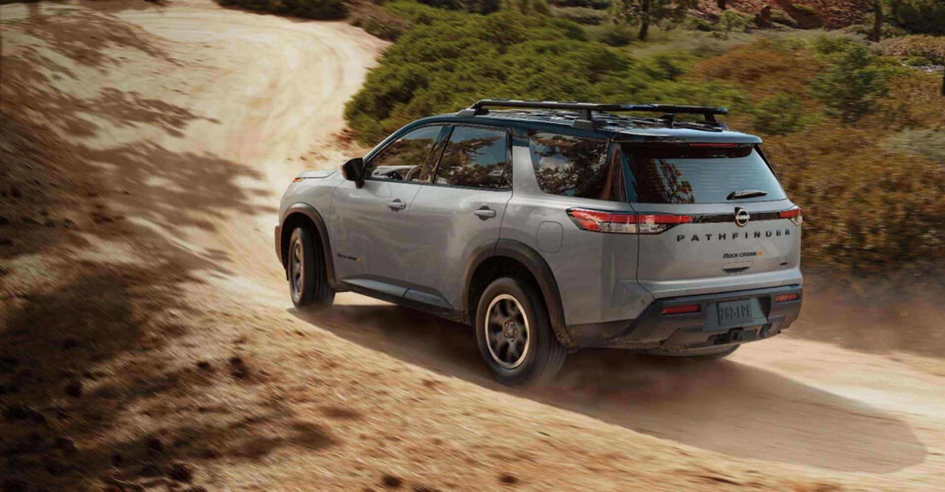 2025 Nissan Pathfinder driving on dirt road