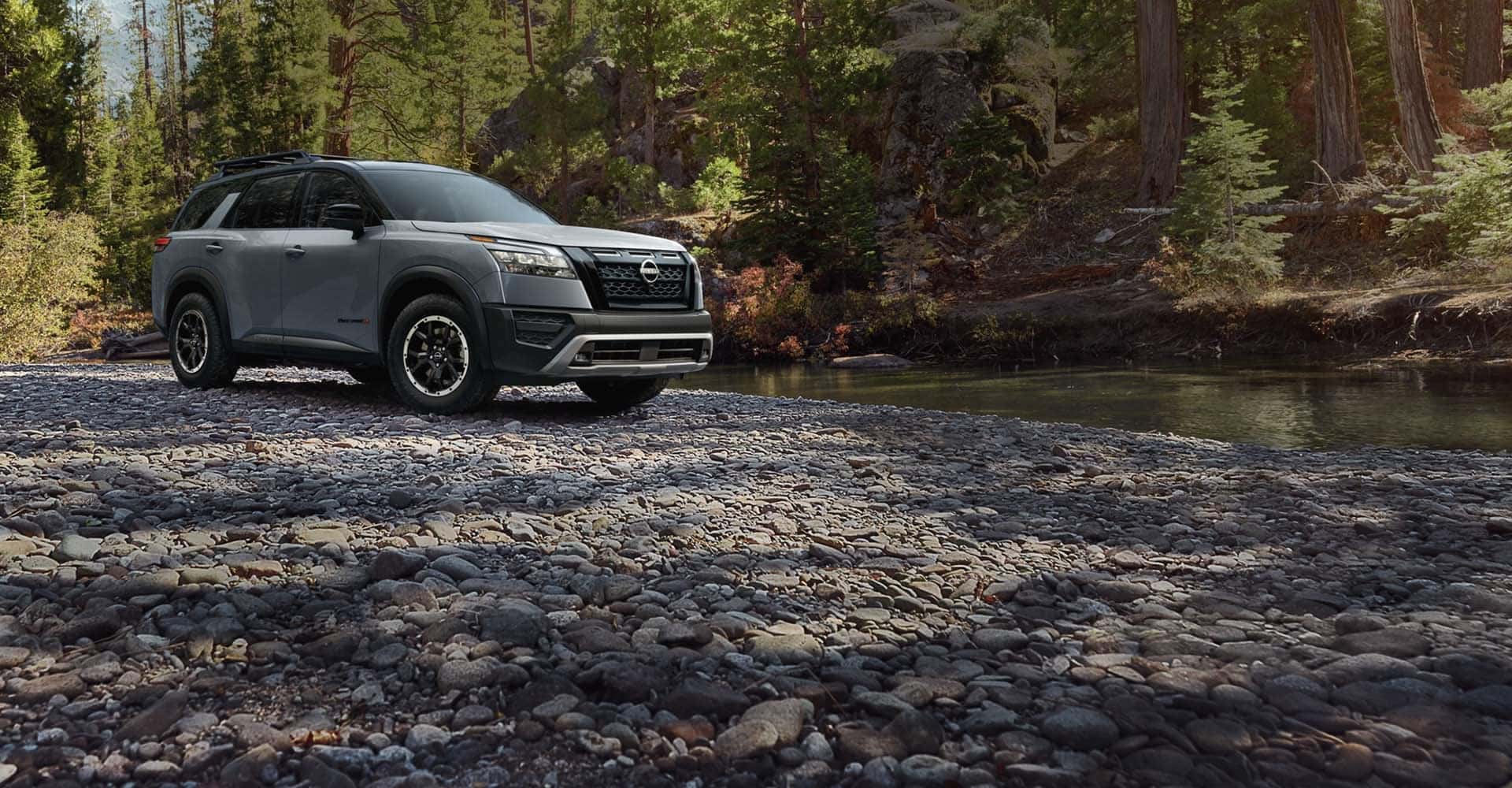 2025 Nissan Pathfinder near a riverbed