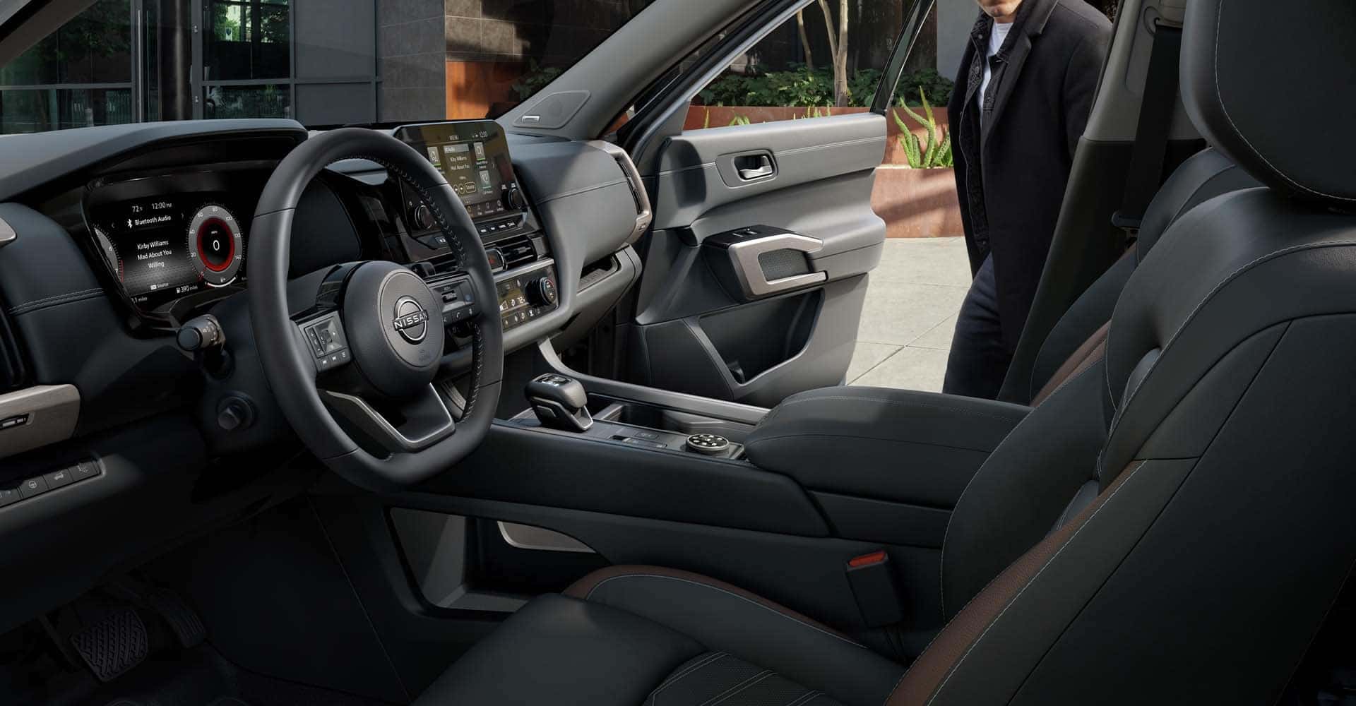 2025 Nissan Pathfinder person getting into car