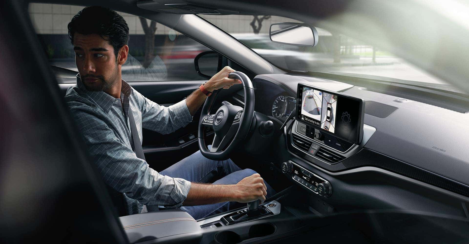 Man in 2025 Nissan Altima Backing-up