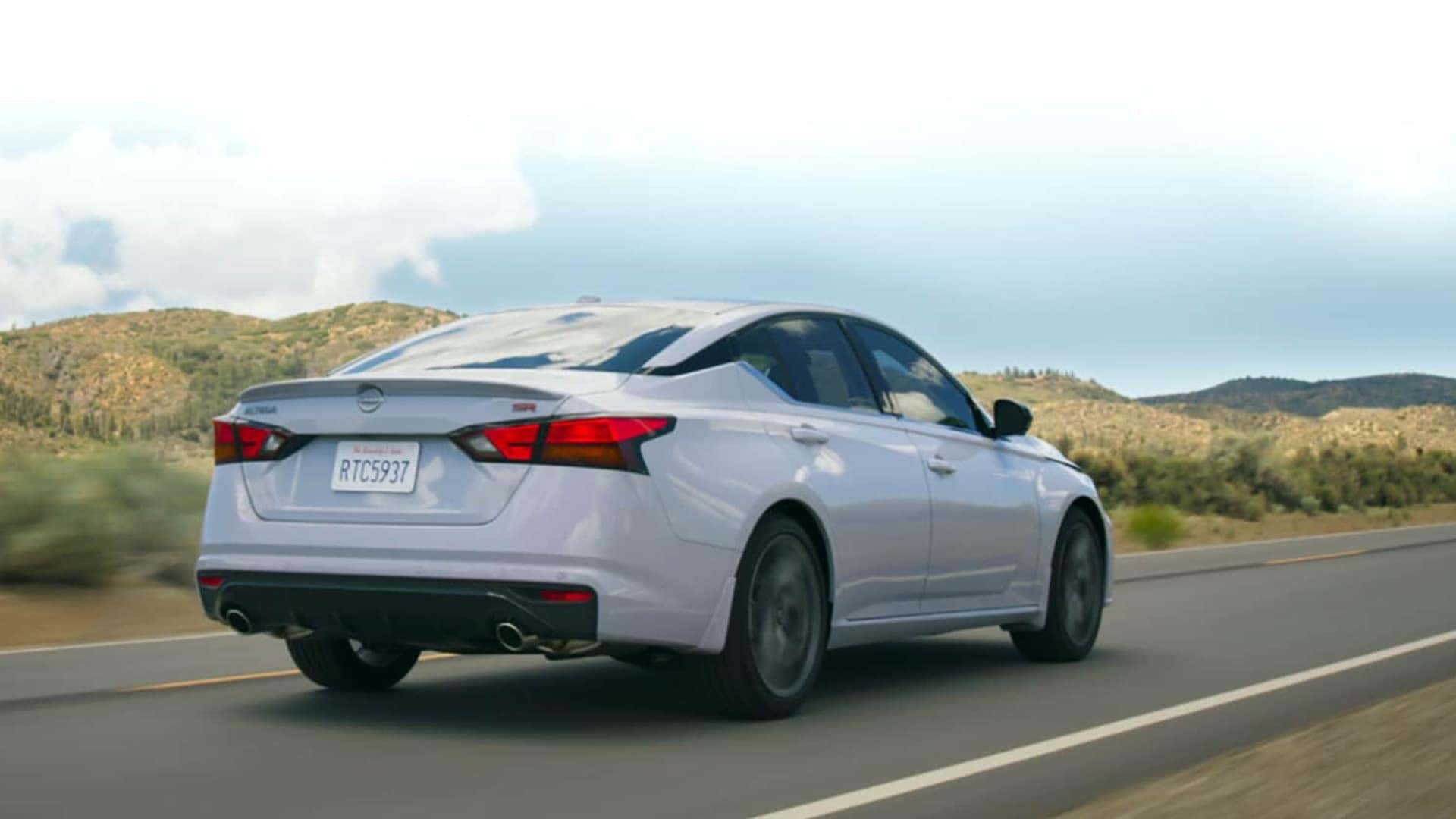 Back View of 2026 Nissan Altima Driving on Road