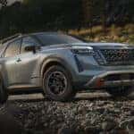 2026-nissan-pathfinder-driving-mountain-road-t-v2