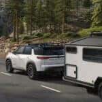 2026-nissan-pathfinder-silver-exterior-towing-trailer-forest.xmp