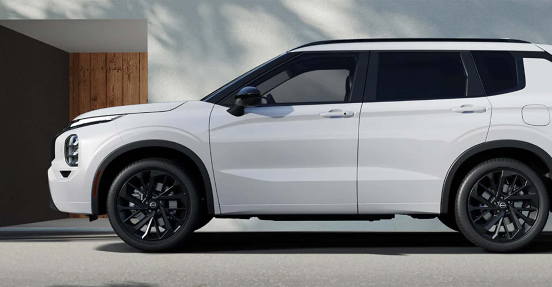 2026-nissan-rogue-phev-side-view-charging