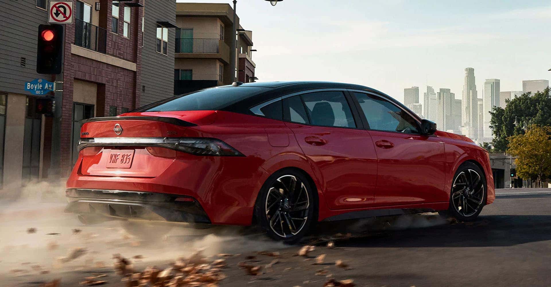 2026-nissan-sentra-rear-three-quarter-dynamic-driving