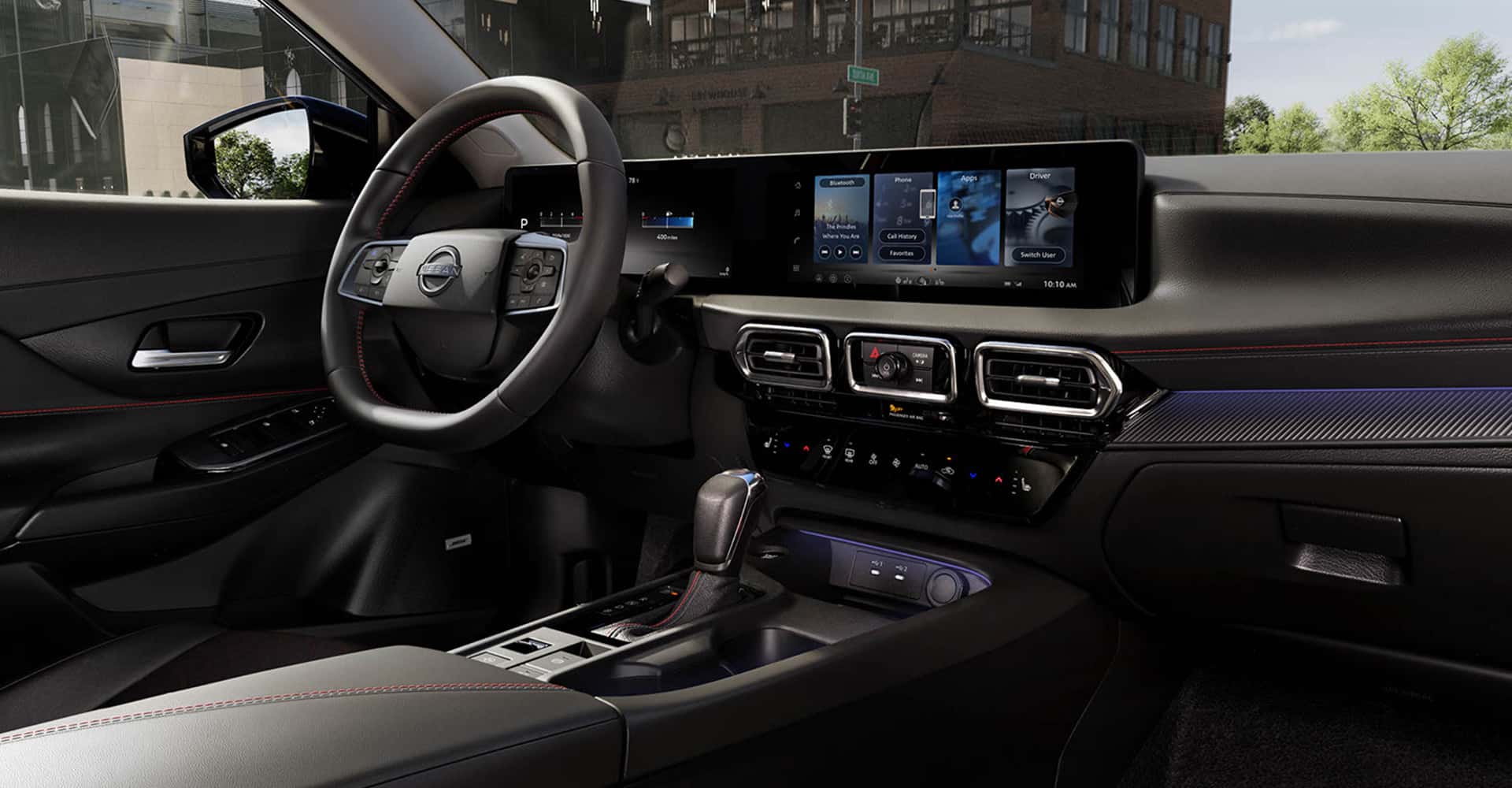 Interior of 2026 Nissan Sentra, looking at dash and steering wheel