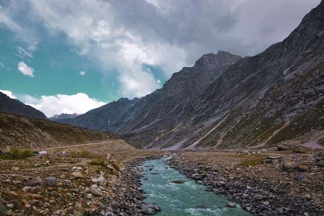 mountains with rocks and a stream