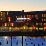 Cannery Pier Hotel at dusk overlooking the water