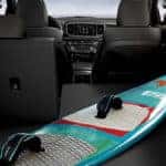 Surfboard in cargo area of Kia Sportage