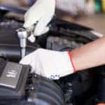Mechanic Working on Engine