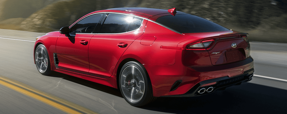 Red 2019 Kia Stinger Driving on Highway